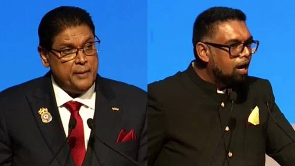Suriname President Chandrikapersad Santokhi (L) and his Guyana counterpart Irfaan Ali in Indore.